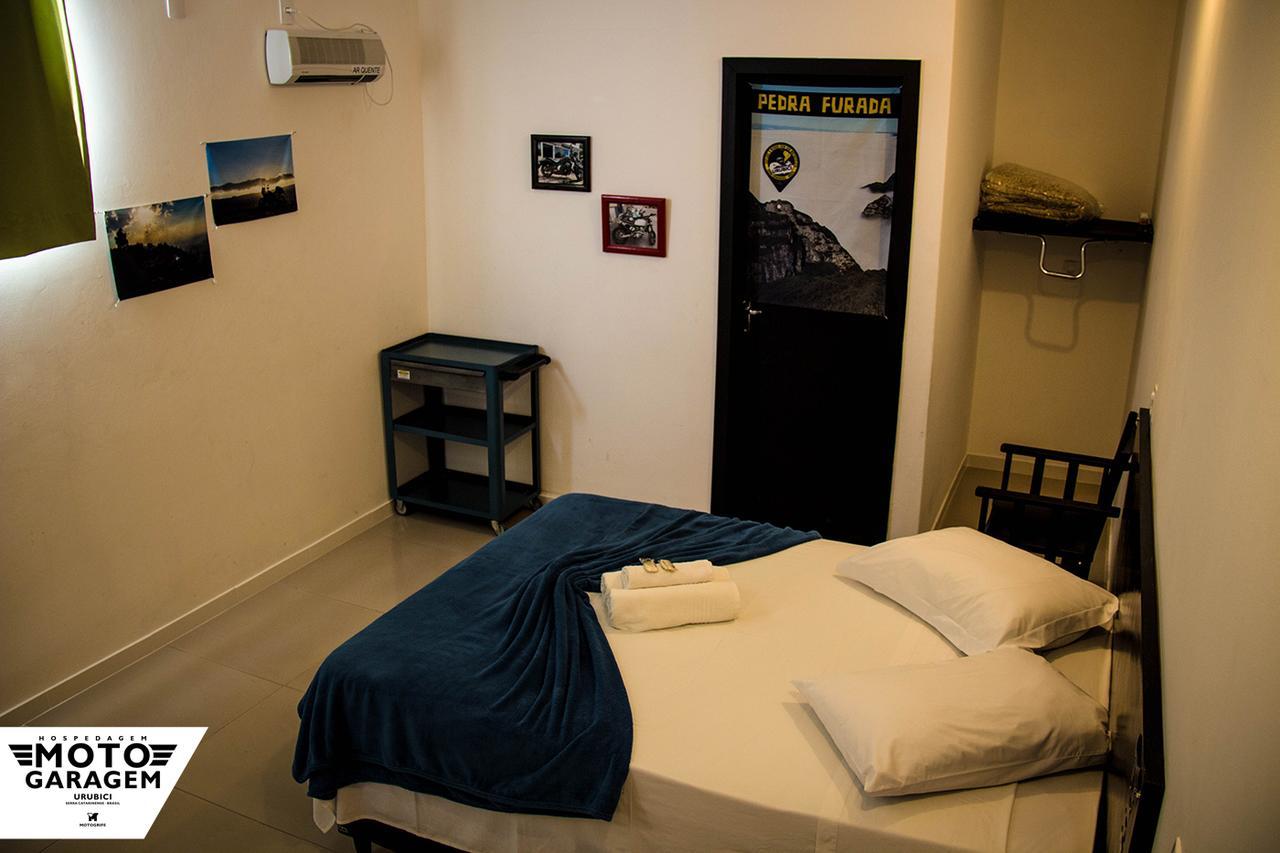 Motogaragem Apartment Урубиси Екстериор снимка